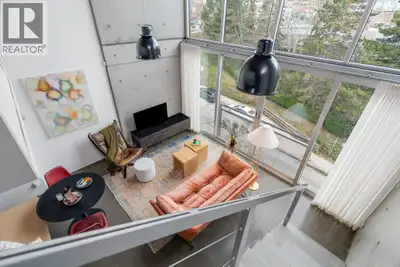Architecturally stunning, fully furnished 2-level penthouse loft by renowned architect Arthur Ericks...