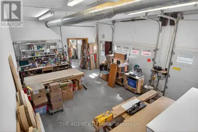 What truly sets this property apart is the 1,300 sq ft attached commercial-grade garage. Intentional...