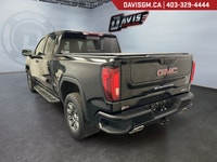 The 2024 GMC Sierra 1500 AT4 Crew Cab Short Box 4WDblends premium craftsmanship, rugged off-road cap... (image 6)