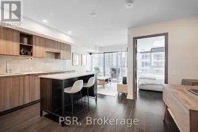 This beautifully designed 1-bedroom + den condo offers unmatched downtown living with breathtaking e...