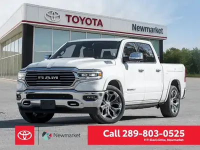 Experience the powerful and refined 2020 Ram 1500 Longhorn 4x4 Crew Cab 5'7" Box in a pristine white...