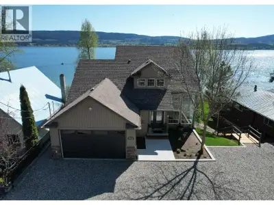 Experience lakefront living at its finest on beautiful Dragon Lake! This modern executive home has s...