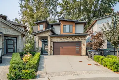 Welcome to this stunning 3-level custom built home in desirable Fraser Heights. Designed with soarin...