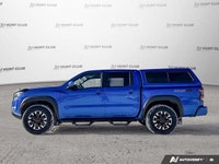 Awarded a 2024 IIHS Top Safety Pick, this striking blue 2024 Nissan Frontier Crew Cab Pickup excels... (image 2)