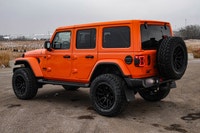 This Jeep Wrangler has a strong Regular Unleaded V-6 3.6 L/220 engine powering this Automatic transm... (image 1)