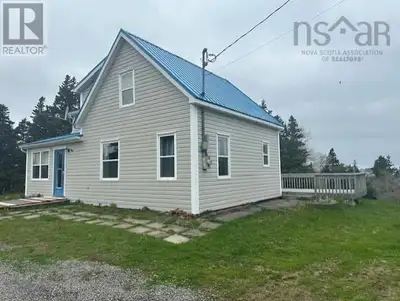 Nestled behind the trees and not visible from Fox Island Main Road sits this well-cared for little g...