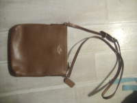 Light brown coach side purse.like new