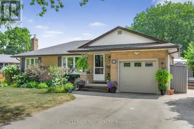 Just steps to the Lake!!! This all-brick bungalow is your ticket to relaxed, resort-style living. Fr...