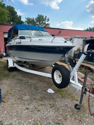 Nice little 19’6” Cuddy with full camper top storage tarp, newer perfect trailer , has Cuddy with to...