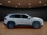 Presenting the 2019 Toyota RAV4 AWD Limited in a pristine white finish, perfect for tackling Canadia... (image 4)