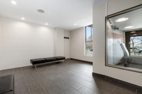 Fully renovated spacious suites with kitchen featuring chrome accents, laminate countertops, new ove... (image 1)