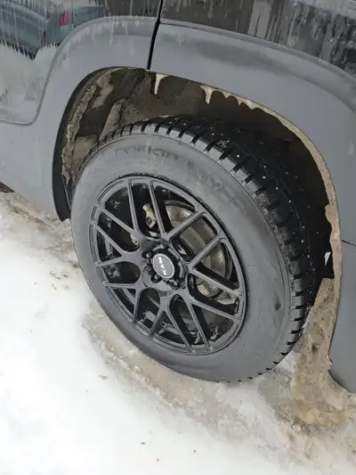 NORDman 7 winter studded Black rims black gloss (aluminum) 225/ 60 R 18 They were on a GMC Terrain E...
