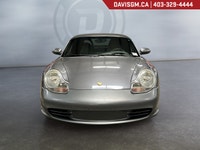 The 2003 Porsche Boxster captures the essence of pure roadster driving, a perfectly balanced mid-eng... (image 1)