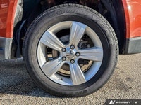 Adventure meets everyday comfort in this *2012 Jeep Compass Sport*, finished in eye-catching *Copper... (image 9)