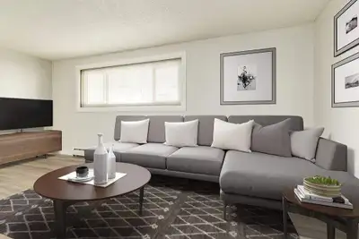 Amenities: Bright Rooms • Affordable Parking • Shared Yard Suite & Building: One-bedroom, two-bedroo...
