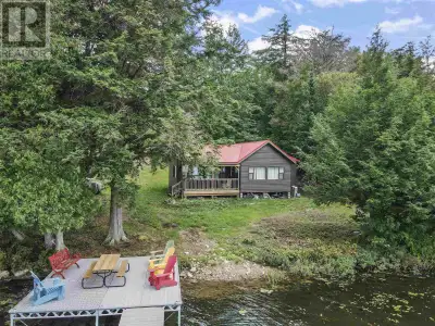 Escape to your own private waterfront paradise in beautiful Algoma! Total privacy, over 6 acres with...