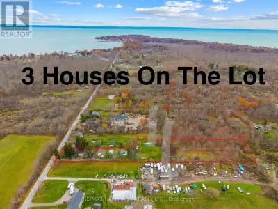 3 houses on the lot! Unique property spread on a 101.80 x 864 ft wooded lot in the desirable area of...