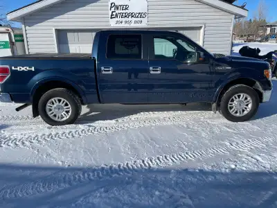 2014 FORD F150 LARIAT CREW CAB BLUE IN COLOR,198,000KM, 5.0L LEATHER INTERIOR,LOTS OF POWER OPTIONS...