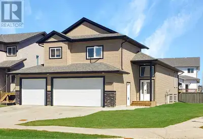 5 bed 3 bath with a triple car garage in Royal Oaks!Beautiful large home directly across from St. Ca...