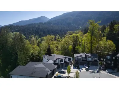 Gorgeous 5 bed, 4 bath 1/2 duplex on Marble Hill with no strata fees or restrictions! More than just...