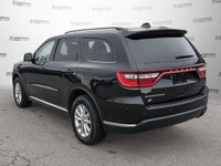 Equipped with comforting heated front seats and a heated steering wheel, this 2021 Dodge Durango SXT... (image 3)