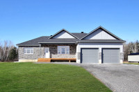 BRAND NEW Bungalow on a PREMIUM lot backing onto green space