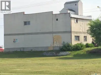 Located in the town of Hudson Bay, SK, this versatile property offers a unique blend of commercial a...