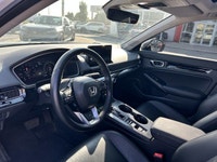 Experience the refined elegance and exhilarating performance of this 2023 Honda Civic Sedan Touring,... (image 4)