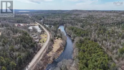Enjoy the sights and sounds of nature with this breathtaking 3-acre, riverfront property in the char...