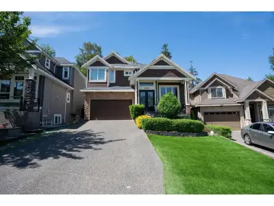 SULLIVAN HEIGHTS OPPORTUNITY! A custom-built family home located in the Sullivan Heights neighborhoo...