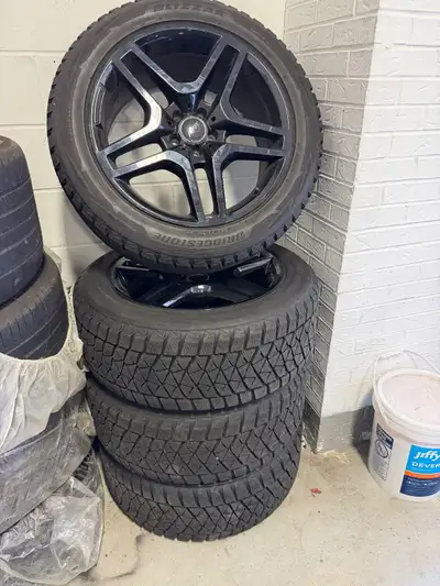 Set of wheels and Bridgestone Blizzak 265/50/20. In excellent shape.