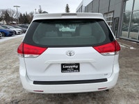 This 2014 Toyota Sienna LE in classic white is a proven, family-friendly minivan known for outstandi... (image 3)