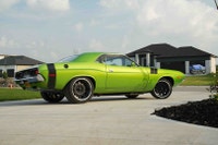 This 1974 Dodge Challenger Pro-Touring build is a standout creation. A gem for fellow car enthusiast... (image 4)