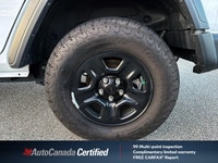 The 2024 Jeep Wrangler Sport in brilliant Bright White, with a mere 33,121 kilometers, is your ticke... (image 6)