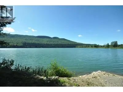 Escape to the serene beauty of the Cariboo with this charming waterfront cabin nestled on the shores...