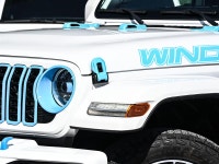The 2024 Jeep Wrangler 4xe High Altitude 4 Door blends open-air freedom with plug-in hybrid power in... (image 4)
