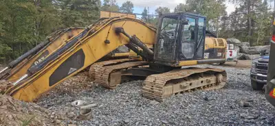 2 to choose from, 2011 Caterpillar 329D L's, units were used in a recycling yard with a shear on the...