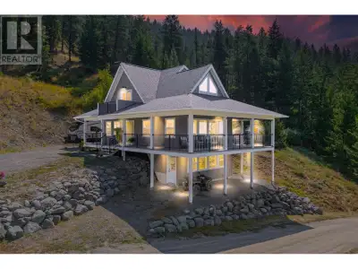 This stunning 2018 custom-built home in McLure with warranty offers commanding views of the North Th...