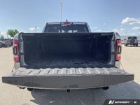 Experience the power and capability of the rugged 2020 Ram 1500 Rebel 4x4 Crew Cab 5'7 Box, availabl... (image 9)