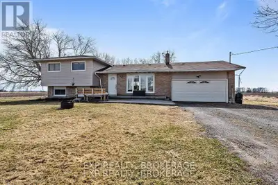 DETACHED HOME UNDER 400K!!!!! This well-maintained sidesplit on Wolfe Island is a rare gem that deli...