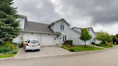 LOVELY  THREE BEDROOM TOWNHOME IN QUIET ENCLAVE