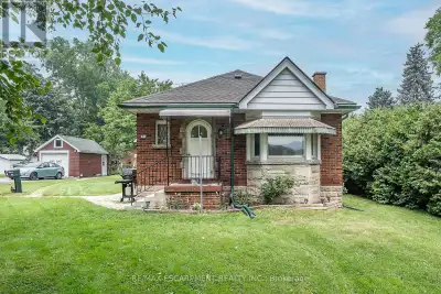 PRIME LOCATION, QUALITY BUILT ALL BRICK BUNGALOW!! This home offers great bones including original h...