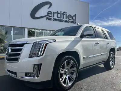 Experience full-size luxury at its finest with this 2015 Cadillac Escalade Premium. This flagship SU...