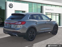 Slide into sophisticated comfort and commanding presence with the 2016 Lincoln MKX Reserve Sport Uti... (image 4)