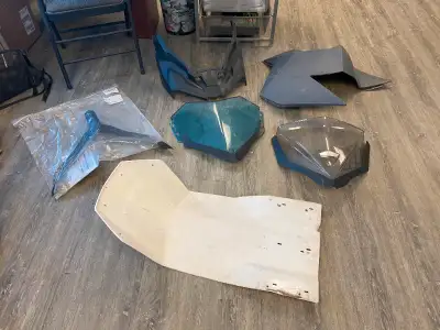Various mid 2000 or so Skidoo Summit parts - Windshields - Nose cone - Side panel - Skid plate Only...