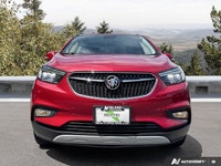 The 2020 Buick Encore Essence, dazzling in Winterberry Red Metallic with a sophisticated Ebony leath... (image 7)