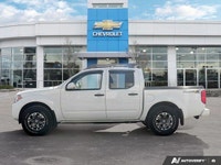 Ready for any adventure or workday, this 2018 Nissan Frontier Crew Cab Pickup in striking Glacier Wh... (image 1)