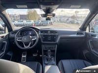 This Volkswagen Tiguan boasts a Intercooled Turbo Regular Unleaded I-4 2.0 L/121 engine powering thi... (image 9)