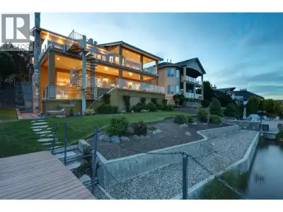 Experience the ultimate in lakeside living in this beautifully designed Casa Loma waterfront home. W...