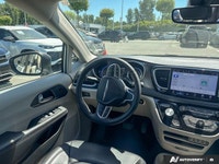 Designed to elevate every family journey, this 2023 Chrysler Pacifica Touring L is the ultimate mini... (image 8)